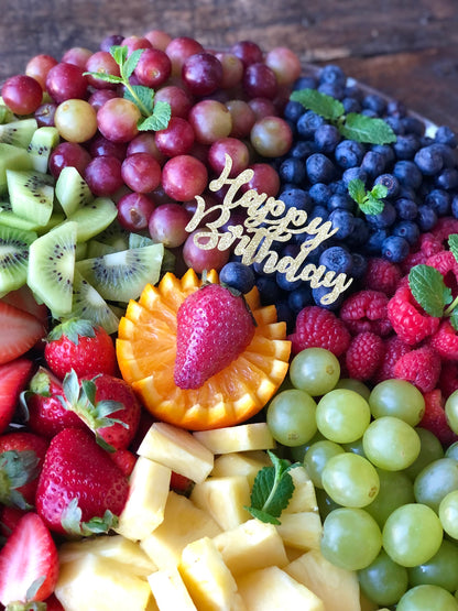 Fruit Graze platter with grapes, blueberries, raspberries, pineapple, strawberries, and kiwi