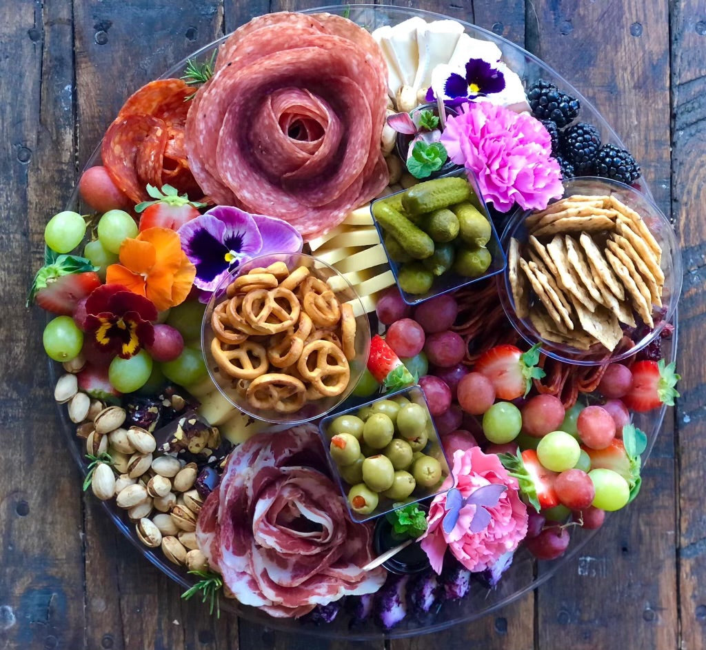 Charcuterie graze platter with meats, fruits, vegetables, cheese and crackers